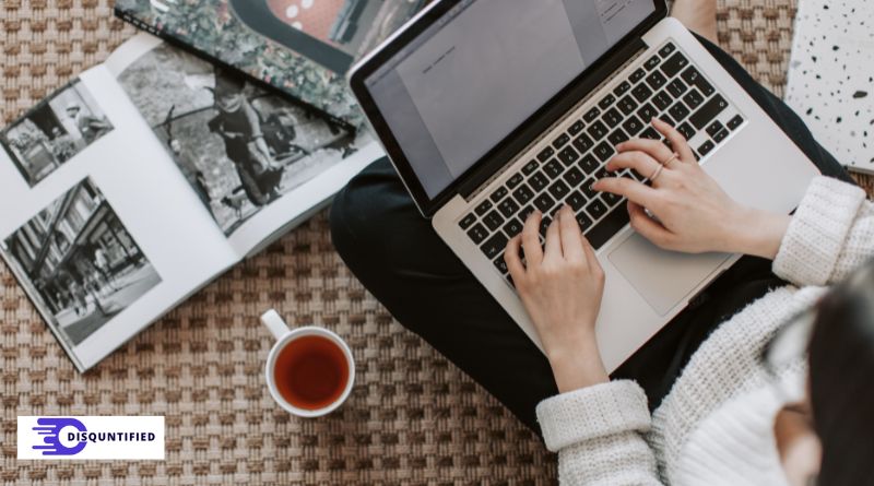 Businesswoman using online faxing service on a laptop